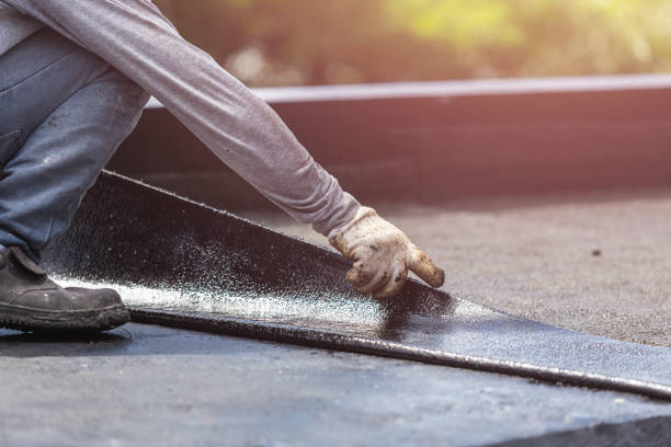 Professional Waterproofing technician working in Glenelg, MD